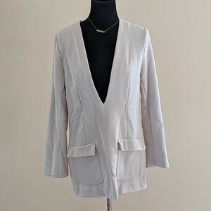 Cream tunic with pockets